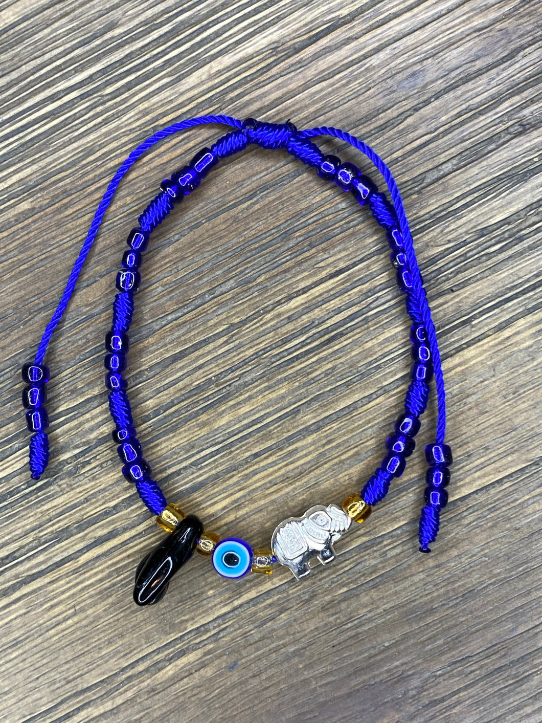 Blue Bracelet With Black Azabache and Charms